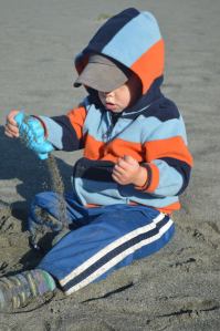 Playing With His New Fish - A Gift From a Neighboring Camper